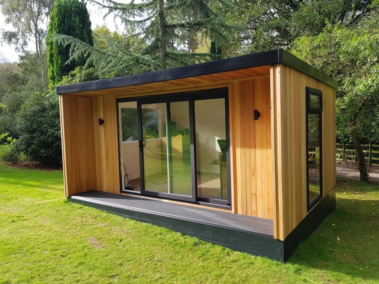 Modular office with timber panelling and sliding glass doors